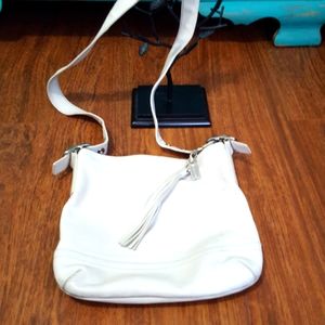 Coach white leather colored cross body purse.